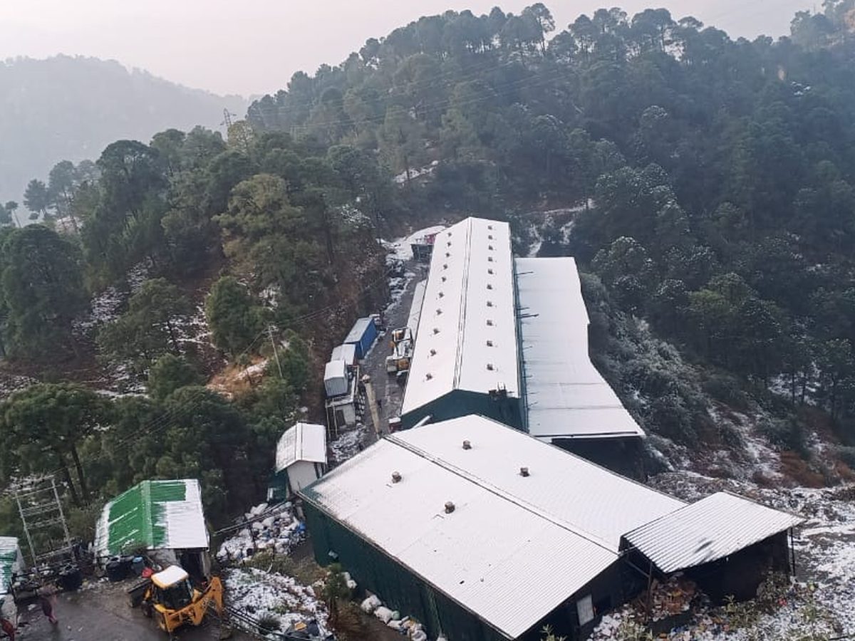 Aerial view of Shimla facility rooftops in snow